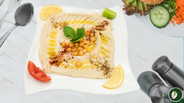 Vorspeise Hummus Teller Berkin ist eine orientalische Spezialität Vegane Küche Hummus ist ein traditioneller und wird gerne bei Catering & Restaurant Aleppo Al Shahba
